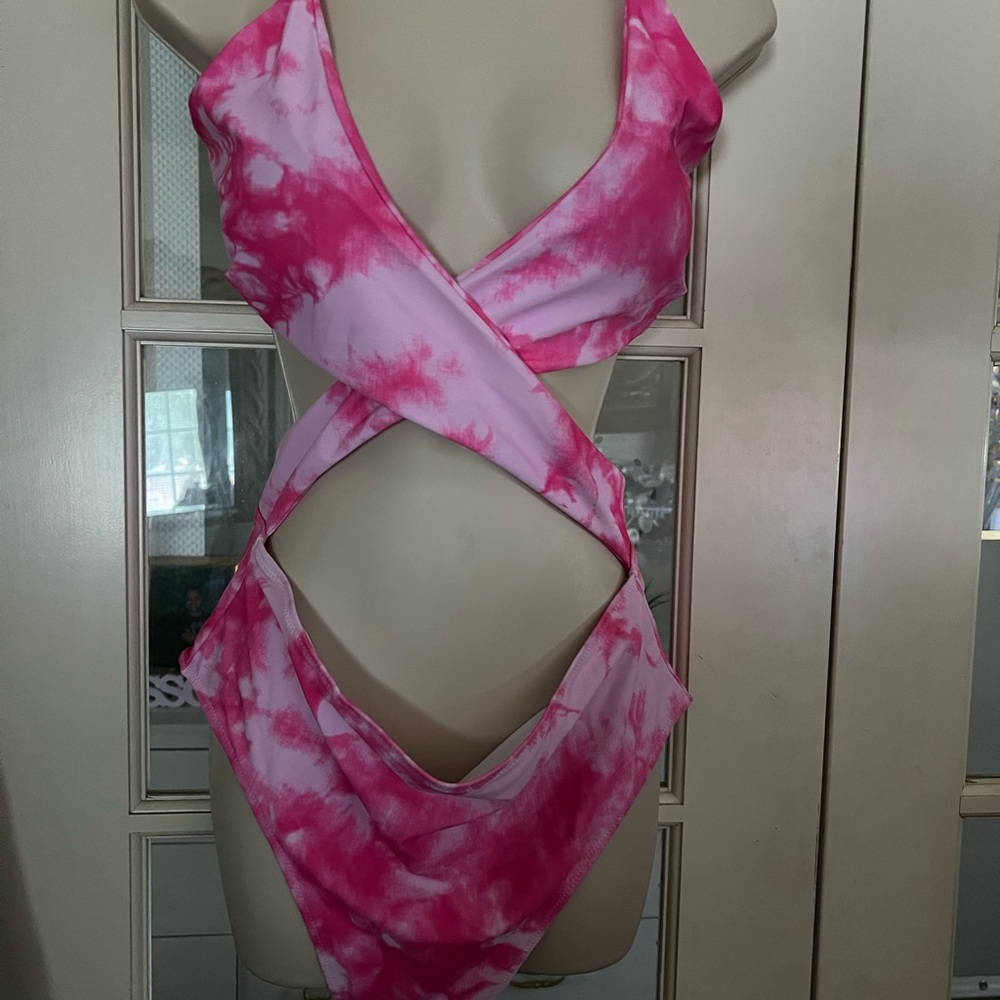 CHYRII women’s criss cross high waisted one piece. Size XL